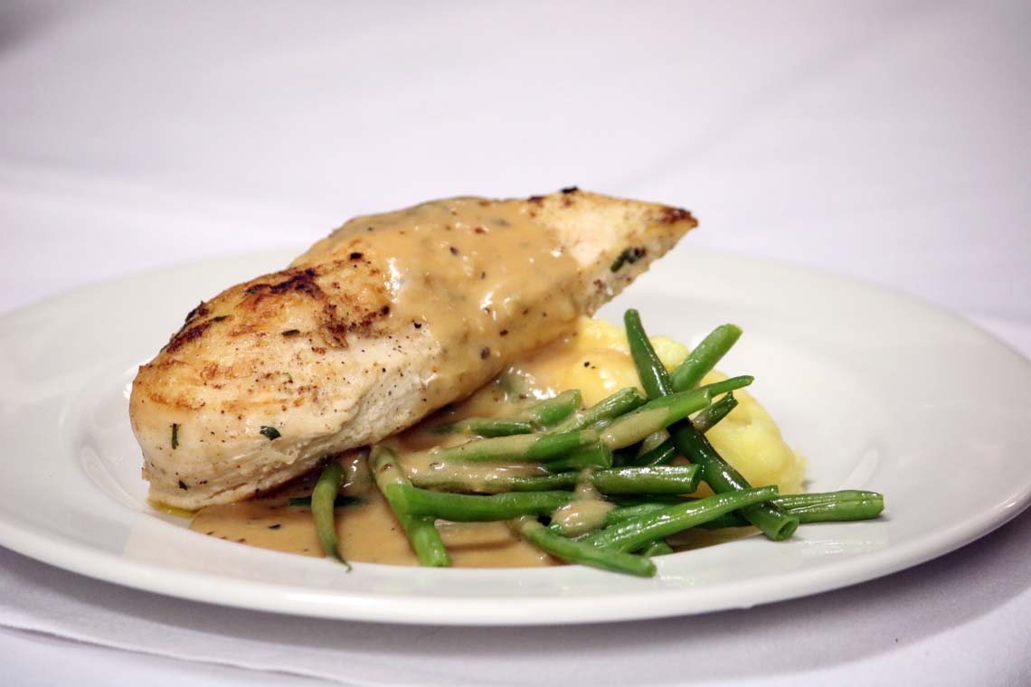 Grilled Suffolk Chicken Breast with Green Peppercorn Sauce, French Beans & Truffle Mash