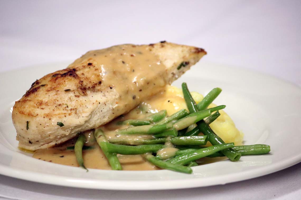 Grilled Suffolk Chicken Breast with Green Peppercorn Sauce, French Beans & Truffle Mash