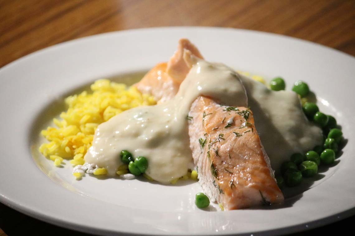 Seared Fillet of Salmon with Peas, Saffron Rice & Dill Velouté