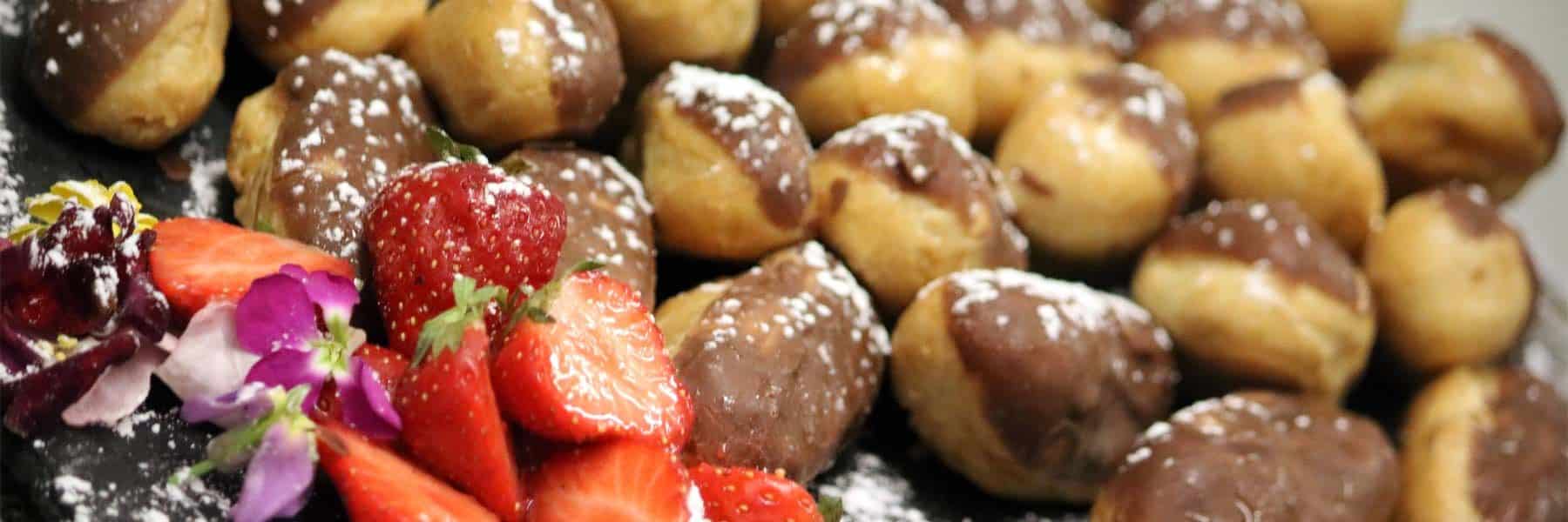Chocolate Éclairs with Strawberries
