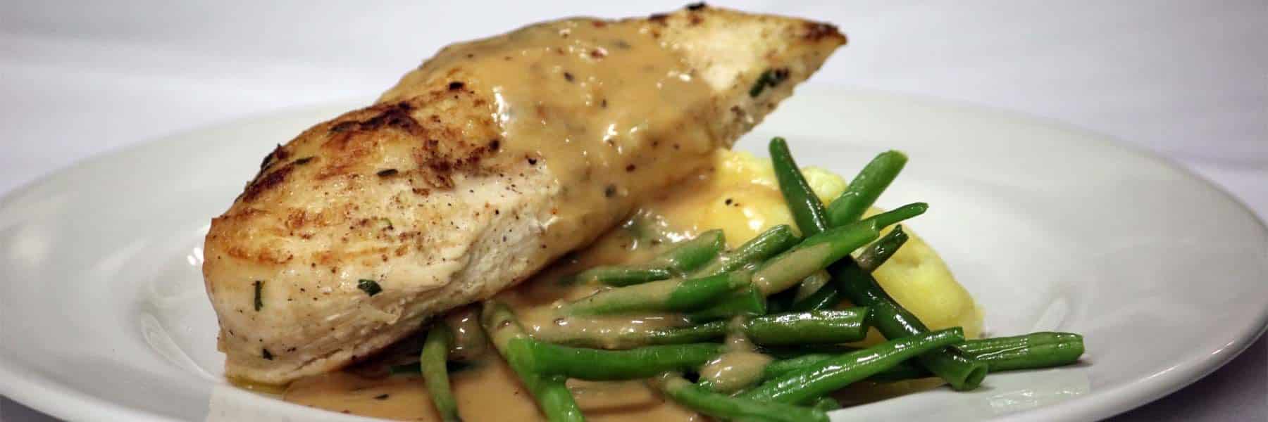 Grilled Suffolk Chicken Breast with Green Peppercorn Sauce, French Beans & Truffle Mash