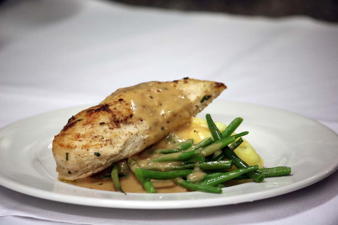 Grilled Suffolk Chicken Breast with Green Peppercorn Sauce, French Beans & Truffle Mash