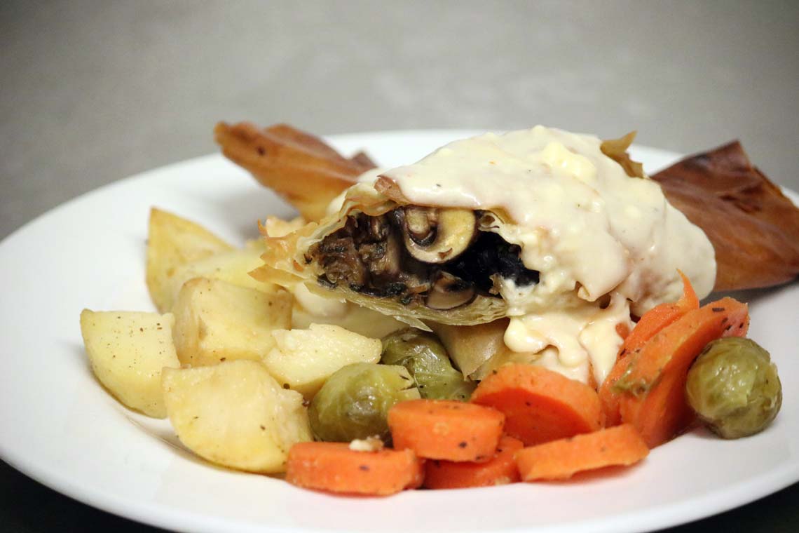 Wild Mushroom Strudel with Oregano & Plum Tomato Sauce (v)