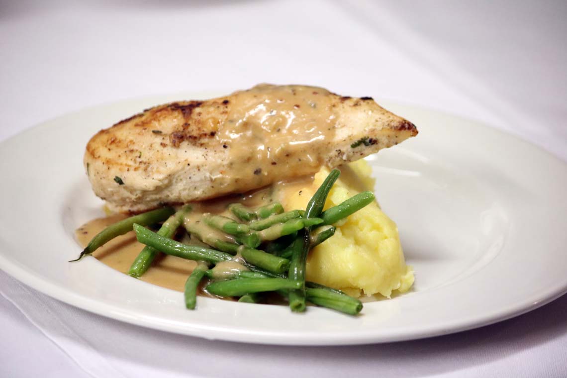 Grilled Suffolk Chicken Breast with Green Peppercorn Sauce, French Beans & Truffle Mash